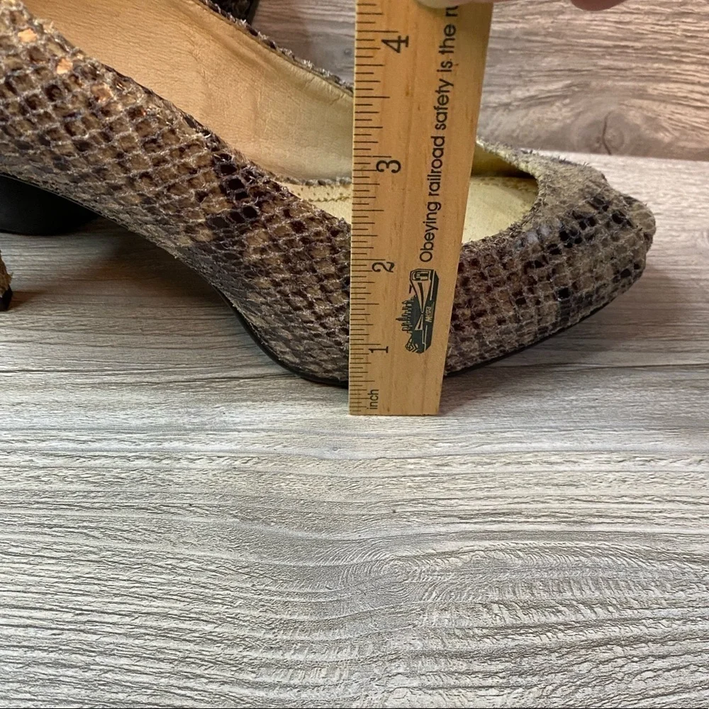 Leather peep toe heels Michael Kors leather snake platform pumps.